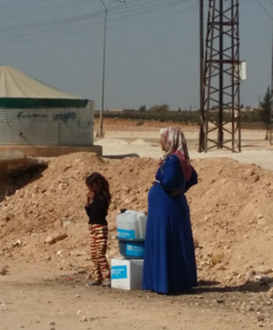 Móðir og barn í Aleppo