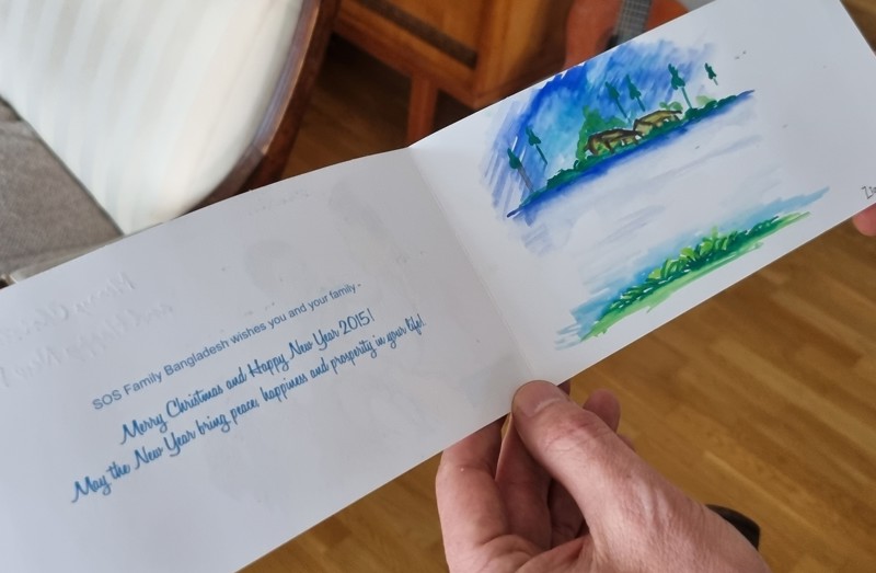 Jólakort sem fjölskyldan fékk frá barnaþorpinu í Bangladess.